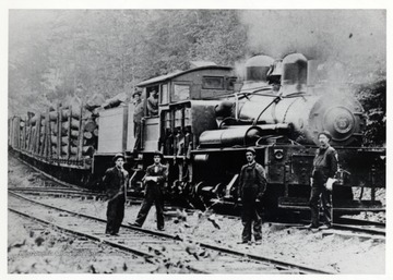 Cass, WV; Second switchback, Cass Hill; Foreground 1-r; 1. Merle Ervin, brakeman 2. Ward Hudson, Conductor 3. Joe Woodell, brakeman; Cab: doorway- Cardock, fireman; throttle- Piney Williams; K.J. Neighbors Collection<br />