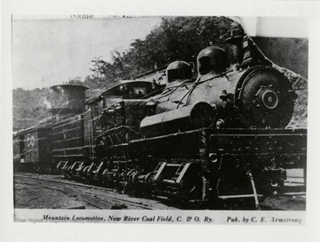 Shay No. 6 engine on tracks.  Published by C.E. Armstrong.  