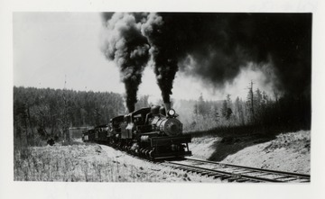 Cass Scenic Railroad.  Two trains connected on a railroad track.  