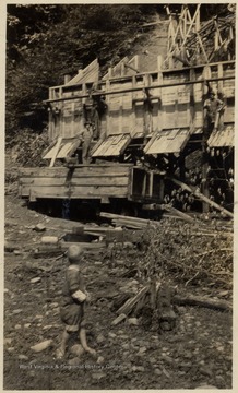 Coal mine entrance.  Child in foreground is Ralph Jones Jr., M.D. a Graduate of W. Va. University. 