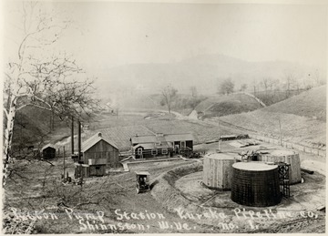 Buildings and oil storage tanks.