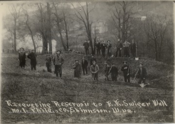 Group photo of oil workers.  