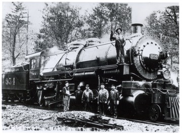 Western Maryland Engine 954, old engine used on the Hendricks.  Crew posed beside and on engine.  