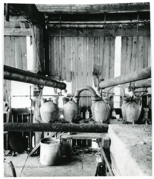 Pipes running to condensors in a building.