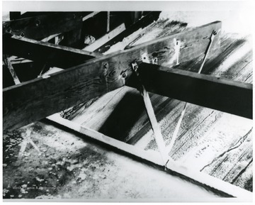 A Salt Rake in use.  After the salt rake was installed, the salt was raked up automatically. (Steam went through under rake heating the brine)