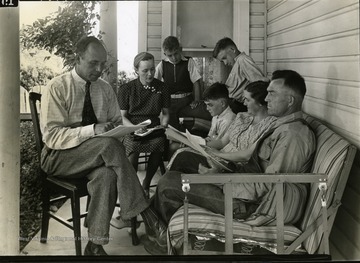 County agent visiting a family of six. Photograph courtesy U.S. Department of Agriculture