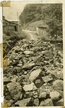 Coal cars loaded by Flynn Lumber Company, Sewell Coal, Nicholas County.