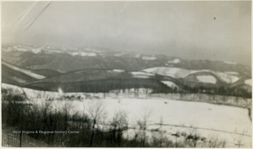 Snow covered mountains in the distance.