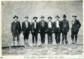 Group portrait of a posse of men sent after a murderer on April 30, 1912.