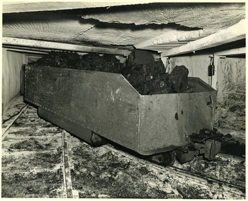 Mine railway car in unknown mine. 