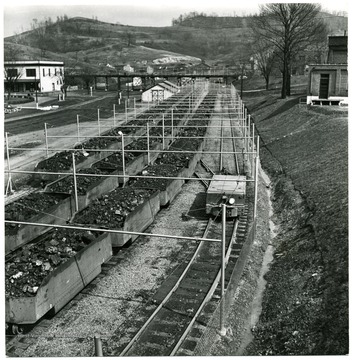 Loaded coal cars outsie of an unknown mine. Credit must be give to William Vandivert, 21 East Tenth St., New York 3, N.Y. 