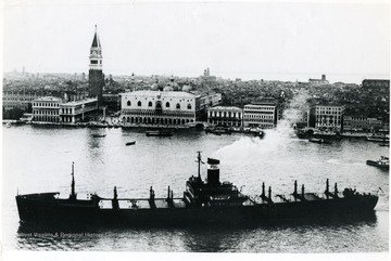 S.S. Pocohontas in the river outside of a town in Italy. Ship has PSCo on the smokestack. Eric H. Muller, 12 Keene Street, East Lynn. Mass.