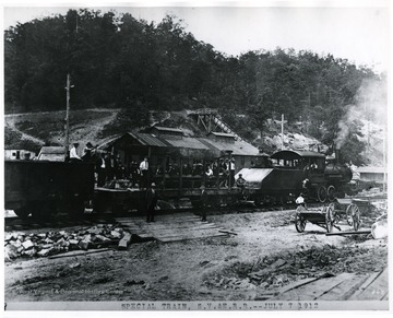 Passengers aboard a special train car.