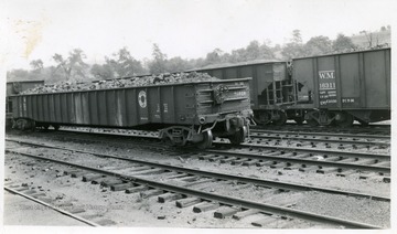 Car No. 50519 and 16311 with others around them.