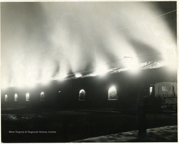 Coke ovens lit up at night.