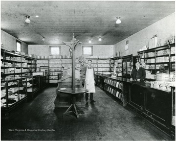 The Company Store at Chiefton, W. Va. Store manager Bartlet is the first on the right. 