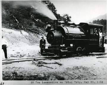 Men posing with the Consol. Coal. Co. Locomotive No. 2 on its trial trip.