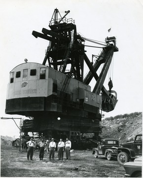 Group Portrait of Men Standing Below the Tiger Coal Shovel