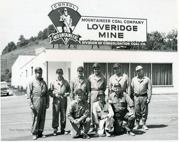 Front Row 'Left to Right'; N.T. Berry, North Western-Hanna, R.C. Larsen,North Western-Hanna, J.J. Larsen, North Western-Hanna. Back Row 'Left to Right'; Robert O'Conner, North Western-Hanna, J.E. Fier, North Western-Hanna, G.M. Allis, North Western-Hanna, M.L. Zhan, North Western-Hanna, Alfred Christopherson, North Western-Hanna, Harry Turner, Superintendent, Loveridge Mine.