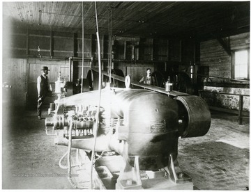 Power generator of the Thurmond Coal Co. Gentleman on the left is George Caperton.