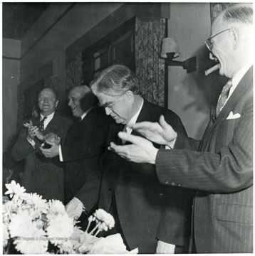 Coal officials around John Lewis clapping during a Consolidation Coal Co. Inspection trip.