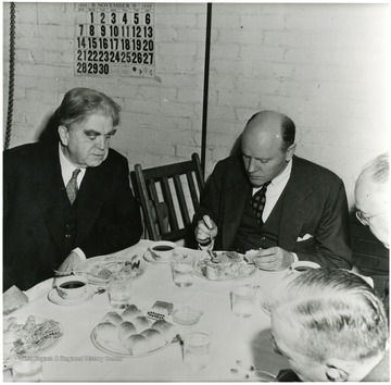 John Lewis at dinner with coal officials during a Consolidation Coal Co. Inspection trip.