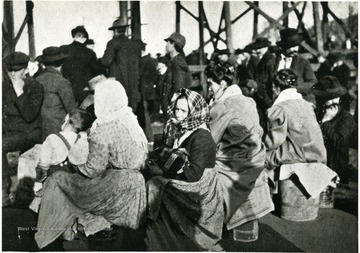 Wives and family members wait for men outside Monongah No. 8 mine. A. G. Martin and Company, Fairmont, W. Va.