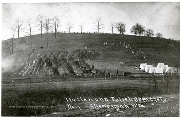 People being buried in an Italian and Polish cemetery after the Monongah Mine Explosion.