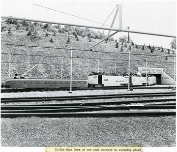 A coal cart from mine no. 32 of Consolidation Coal Co. is leaving with a full load.