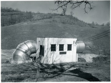 Main mine fan at Jamison No. 9 with field in the background.