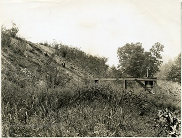 Early water supply for residences. The steps lead up to the homes.