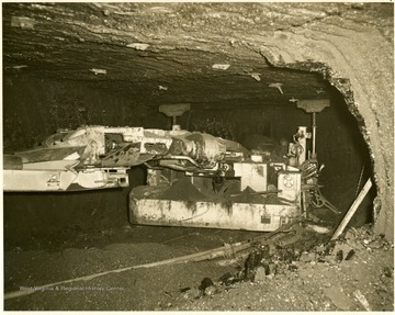 Coal cutting machine digs into the coal seam.