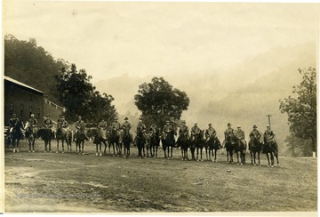 Group portrait of an inspection party on horses at Consolidation Mine No. 214. 