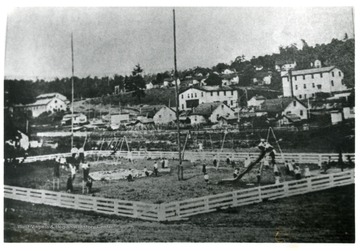 Children playing on playground at Price Hill, W. Va. 