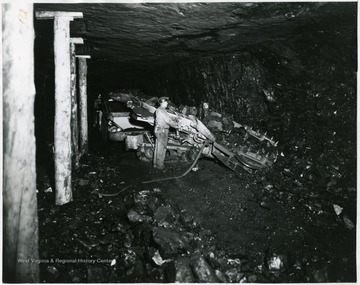 Miner operating a Joy loading machine.