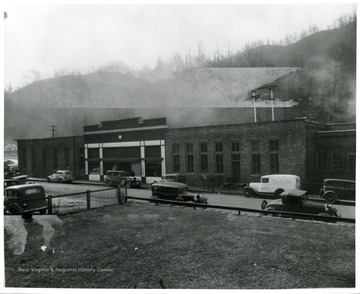 Cars parked in front of the store and office at Coalwood.