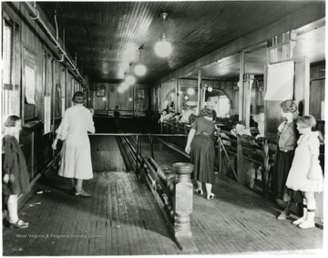 Miners and their families enjoy some time off in the recreation building.