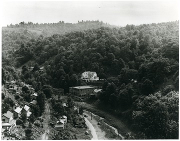 Scenic view of the town of McComas. 'Housing has always been difficult in coal field mountains to find room for the store...'