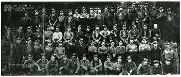 Group portrait of miners.