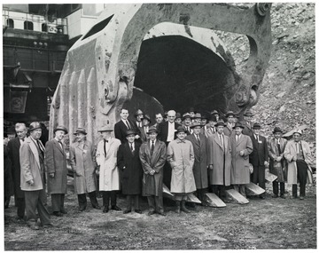 Group portrait of business men in scoop.