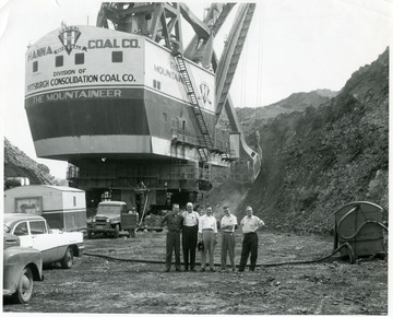 'Westinghouse, Cleveland.' Dick MacFarlane is one person in the picture.