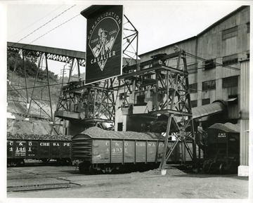 Loading Chesapeake and Ohio railroad cars with coal at the Consolidation Clean Coal Cavalier Preparation Plant #207. 