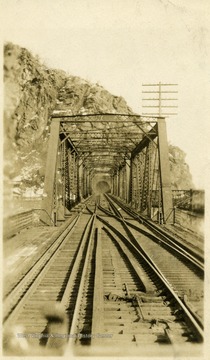 Railroad tunnel at end of bridge which crosses the confluence of the Potomac and Shenandoah Rivers.