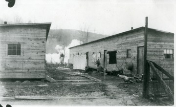 Laundry hanging on line between two barracks in Baxter, W. Va.