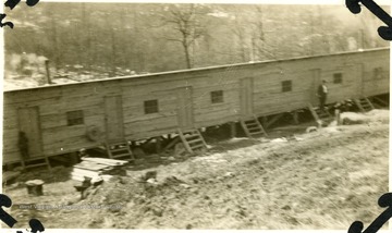 Man stanking on steps of barracks in Tunnelton, W. Va.