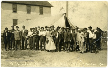 Group portrait of men at a UMWA Camp.