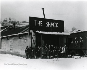 Group in front of the Shack community center on a winter day.