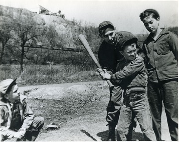 Boys playing baseball. 'For information on the Mountaineer Mining Mission See A & M 2491 (S.C.).'