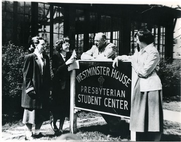 'Rev. Del. Swartz. To his left Glenna Williams. WVU students pastor and Mountaineer Mining Mission Pastor. The WVU Presbyterian Fellowhip students were also helpers at the Shack. For information on the Mountaineer Mining Mission See A&amp;M 2491 (S.C.).'