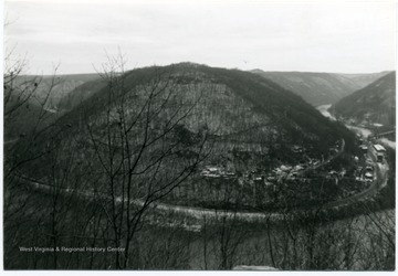 Scenic view of river and buildings at mine.